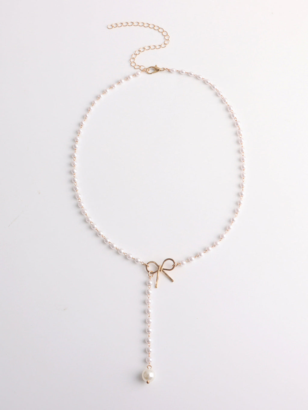 Emma | Exquisite Pearl Bow Necklace with Zirconia Accents 2